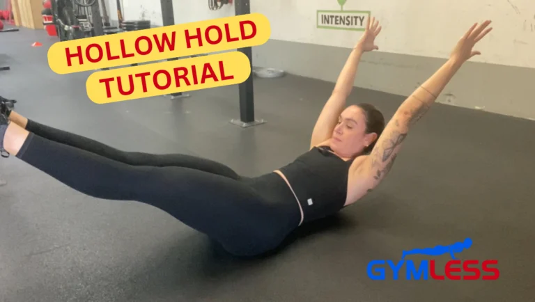 A woman demonstrating how to perform hollow holds on a gym floor.